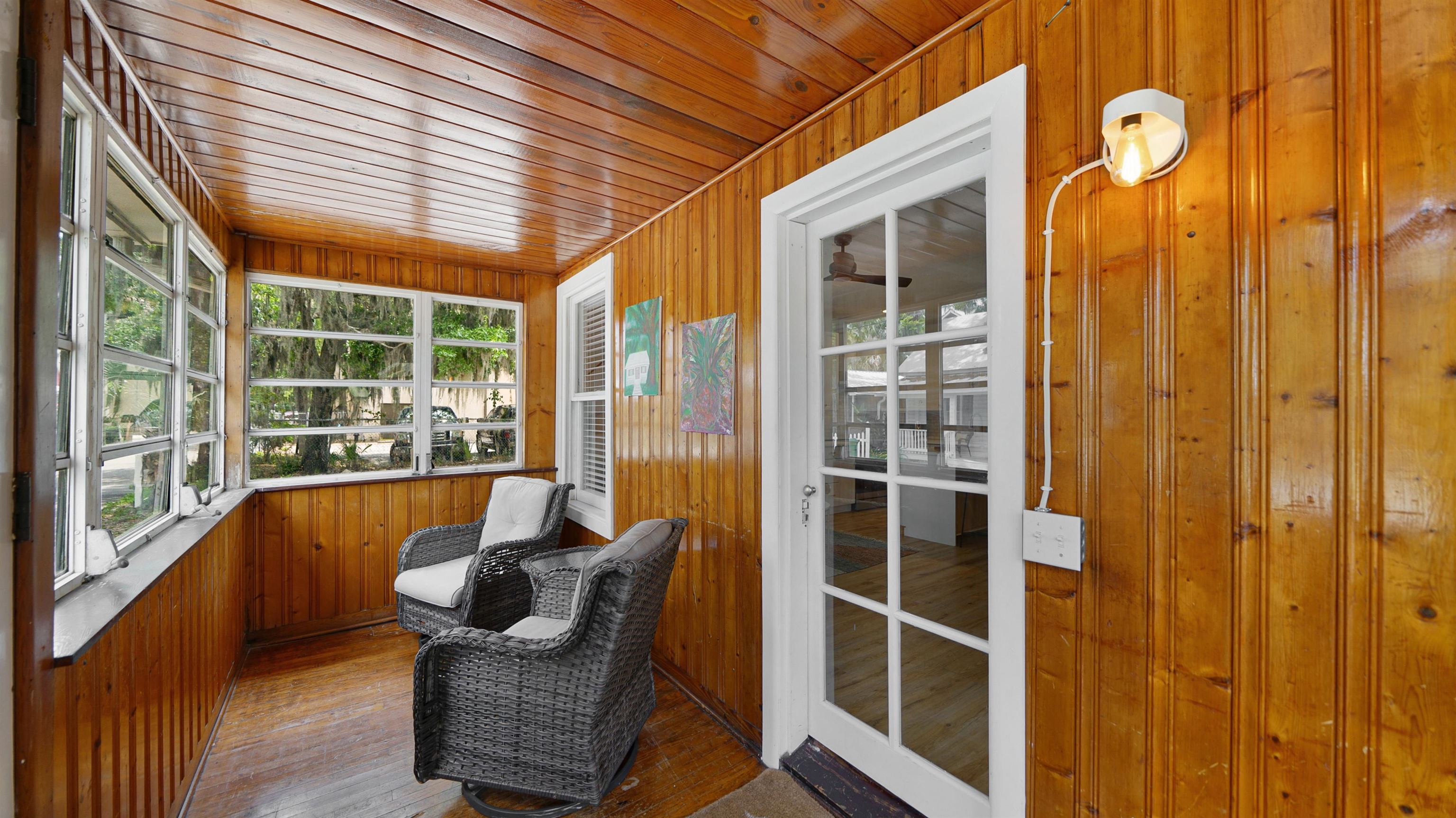 119 Moore Street St. Augustine, FL 32084 - Photo 5 of 49 a view of balcony with two chairs and a window