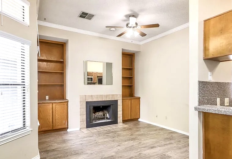 2802 Nueces Street, Unit 211 Austin, TX 78705 - Photo 11 of 14 a view of livingroom with a fireplace