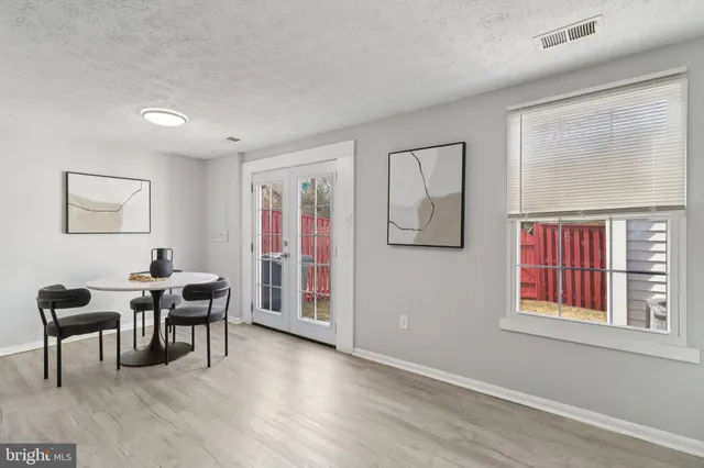 a view of a livingroom with furniture and window