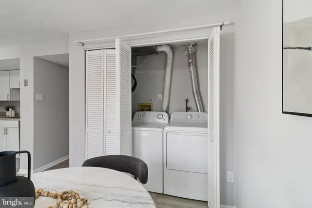 a bedroom with a bed and a television