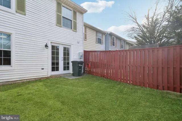 a view of a back yard of the house