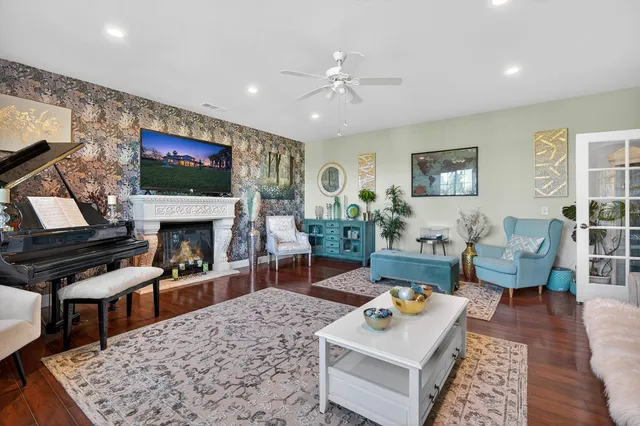 a living room with furniture and a rug