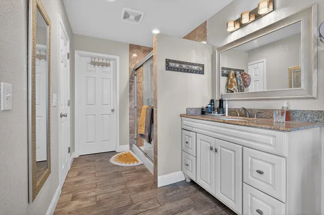 a view of a swimming pool with a patio