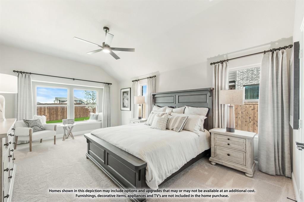 14429 Lovelace Street Pilot Point, TX 76258 - Photo 29 of 36 a bedroom with a large bed and a large window