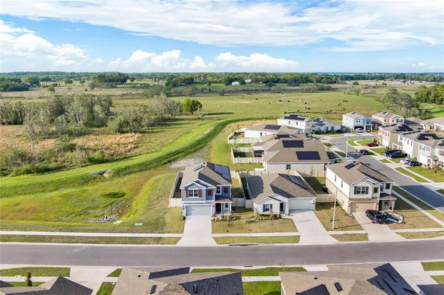 a view of a city with lawn chairs
