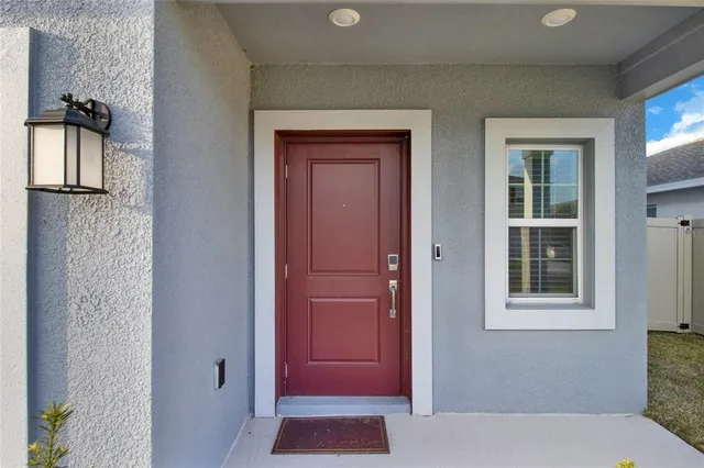 a view of a bedroom from a hallway