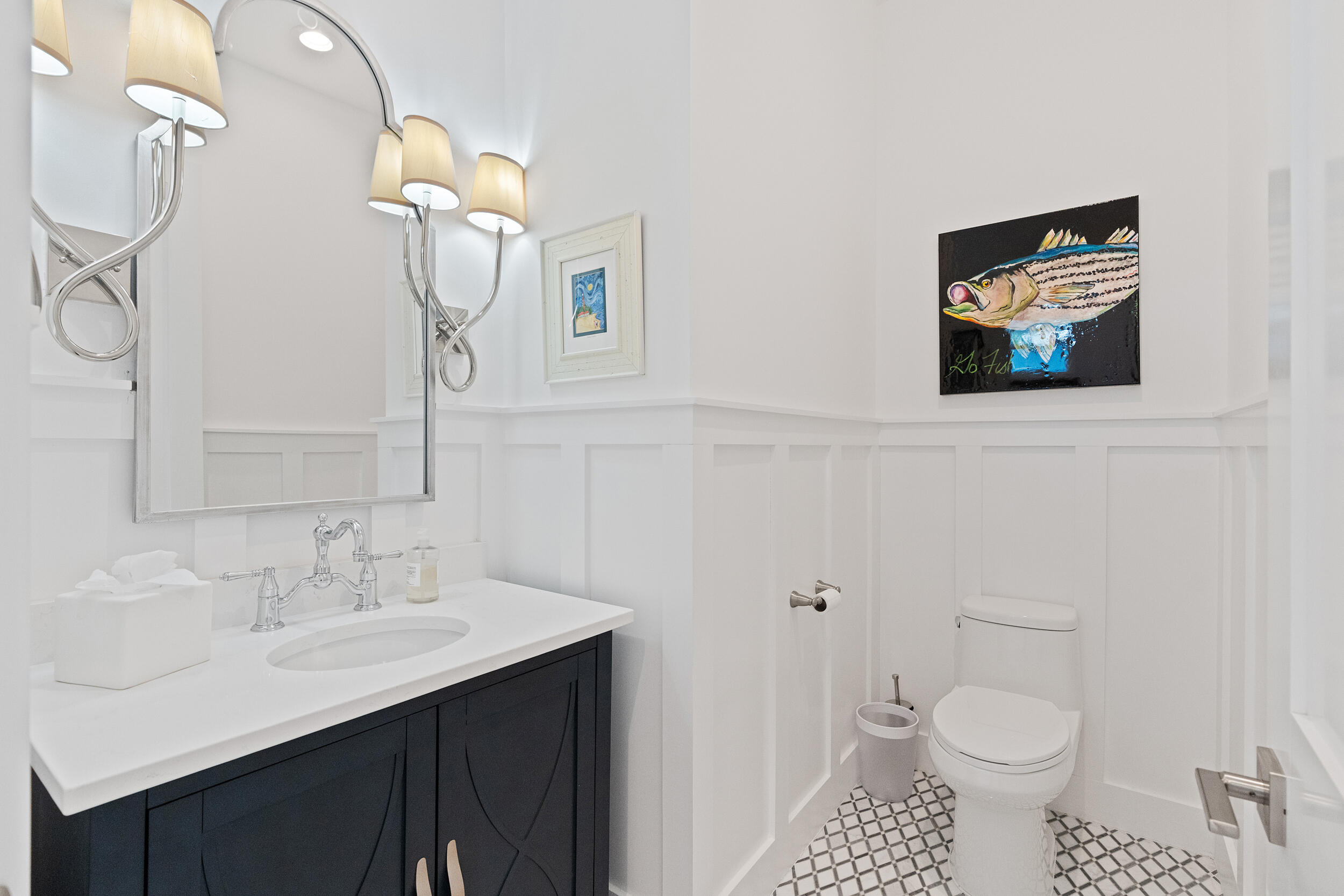1478 Driftwood Point Road Santa Rosa Beach, FL 32459 - Photo 25 of 95 a bathroom with a sink a toilet and a mirror