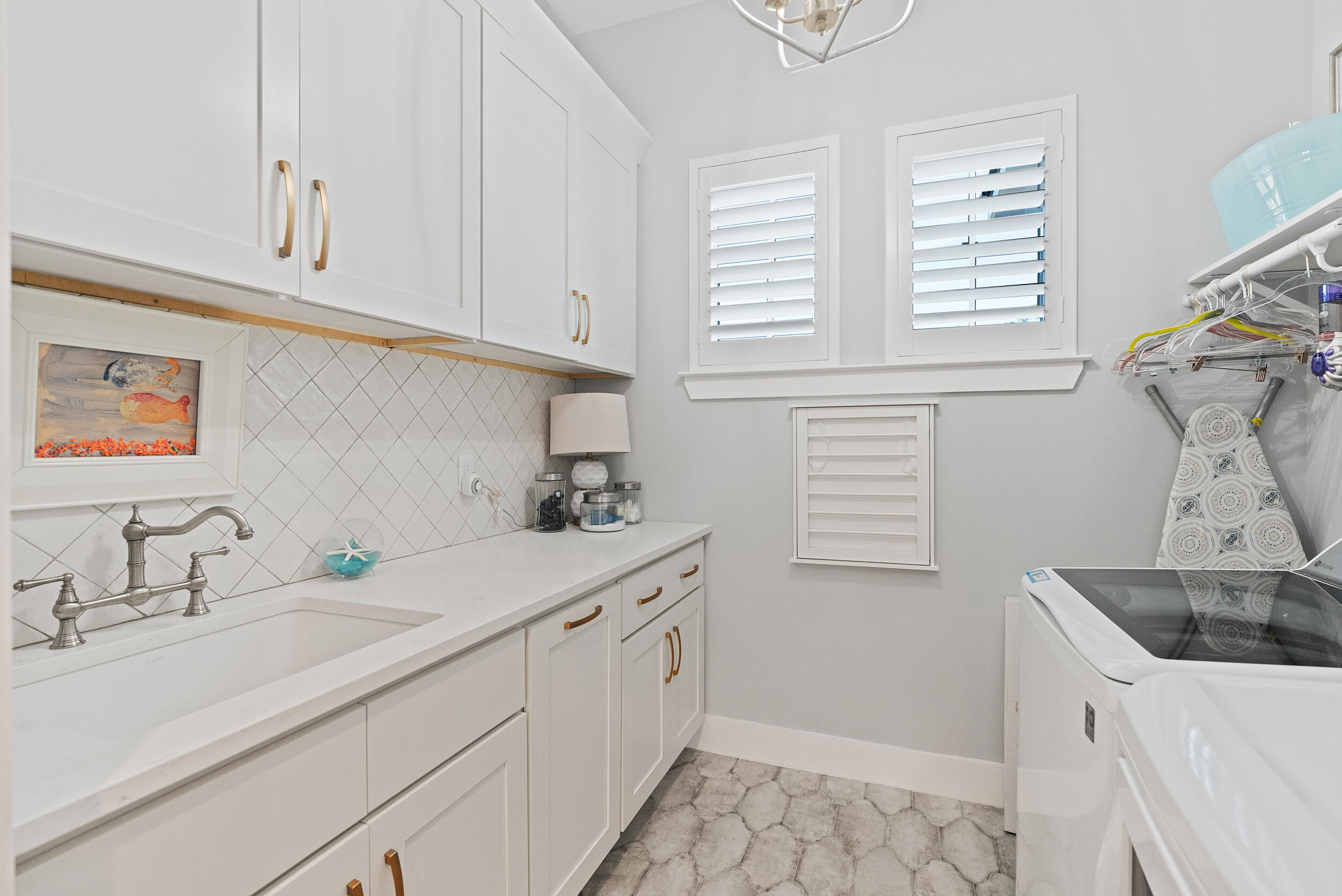 1478 Driftwood Point Road Santa Rosa Beach, FL 32459 - Photo 30 of 95 a bathroom with a sink and a window
