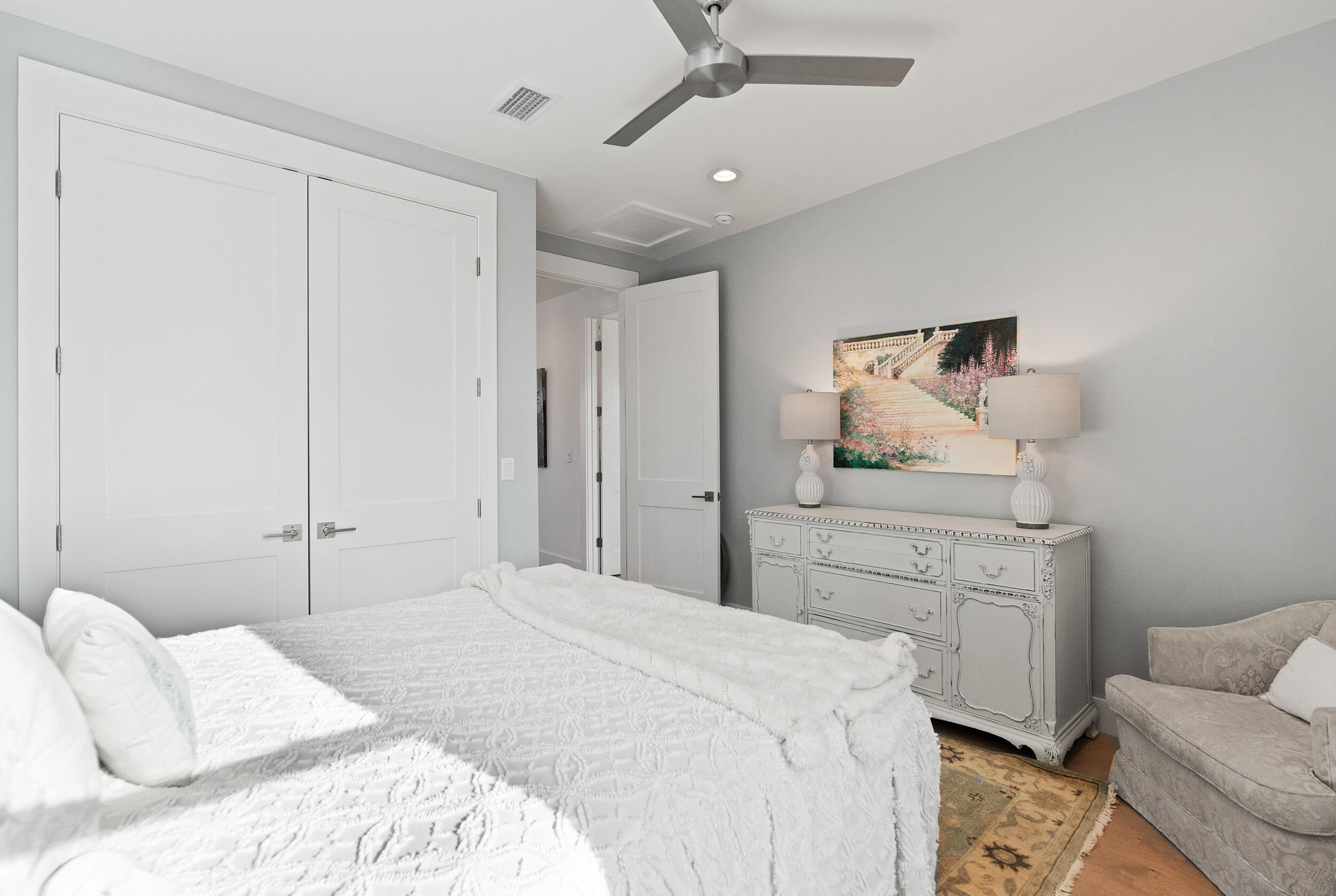 1478 Driftwood Point Road Santa Rosa Beach, FL 32459 - Photo 50 of 95 a bedroom with a bed and wooden floor