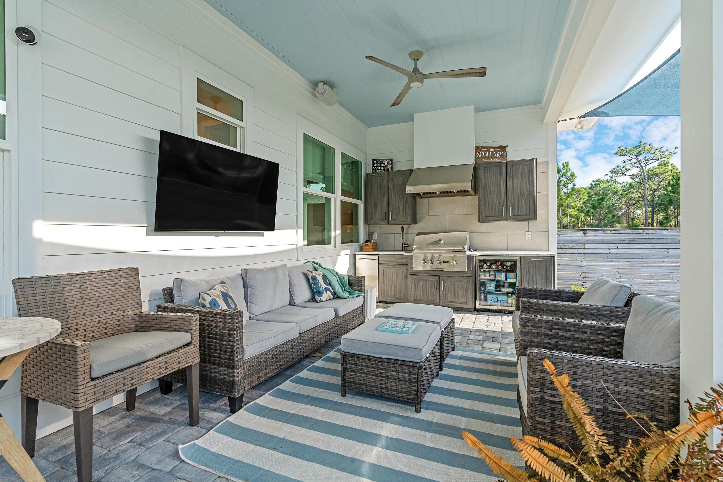 1478 Driftwood Point Road Santa Rosa Beach, FL 32459 - Photo 52 of 95 a living room with furniture and a flat screen tv