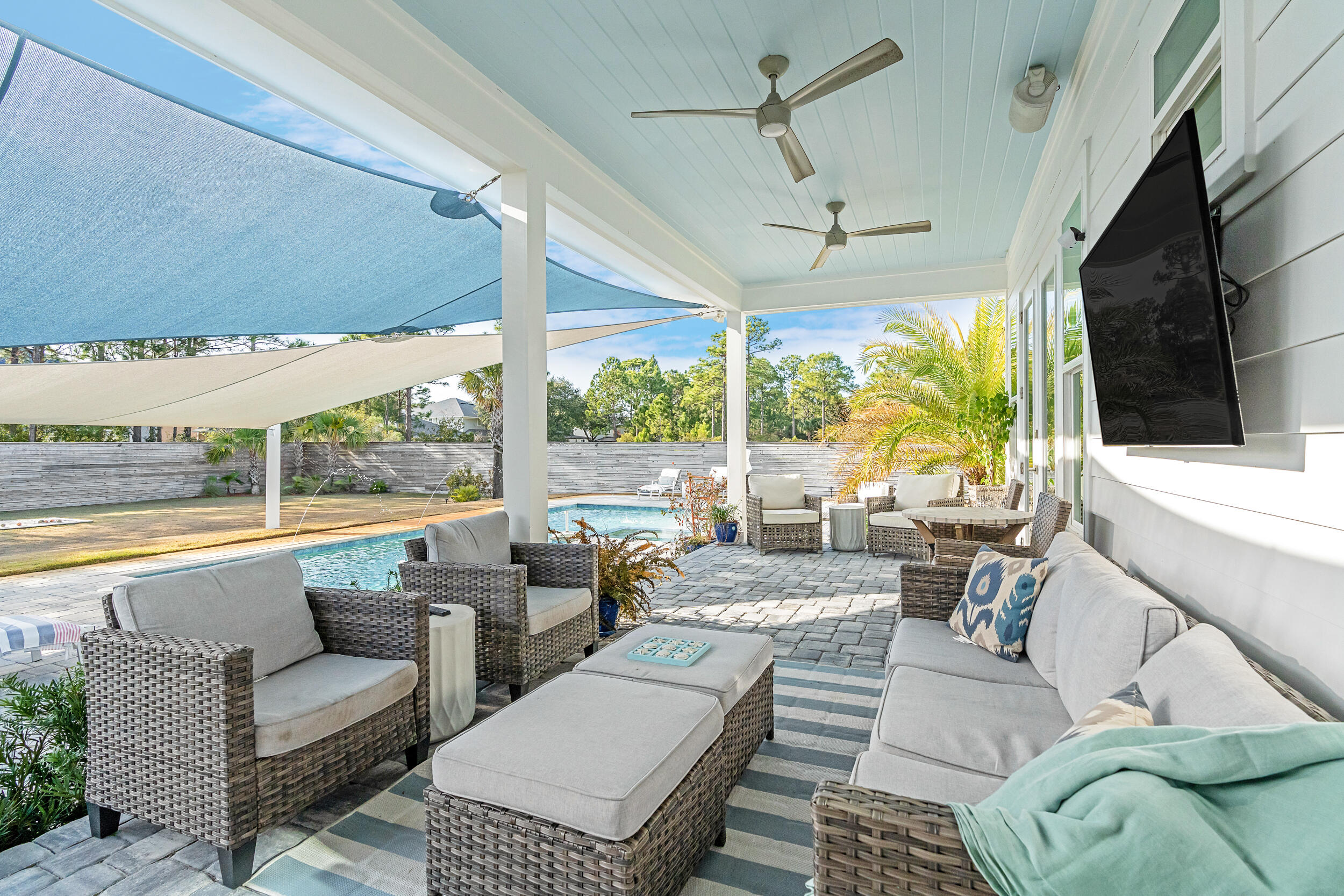 1478 Driftwood Point Road Santa Rosa Beach, FL 32459 - Photo 54 of 95 a living room with furniture and a large window