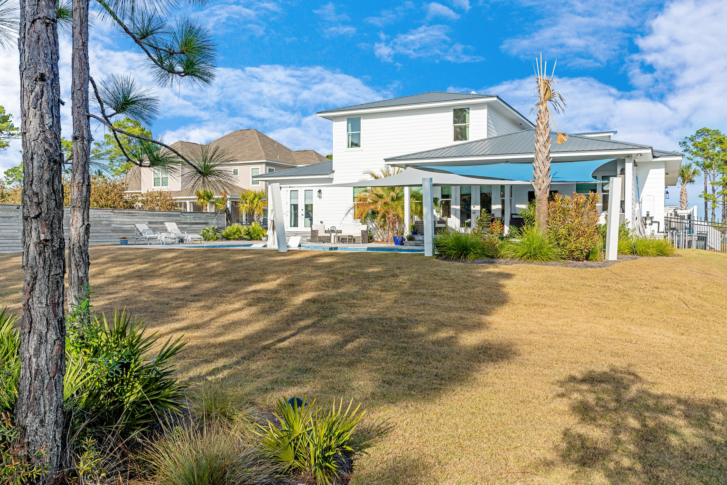 1478 Driftwood Point Road Santa Rosa Beach, FL 32459 - Photo 63 of 95 a view of a building with a garden