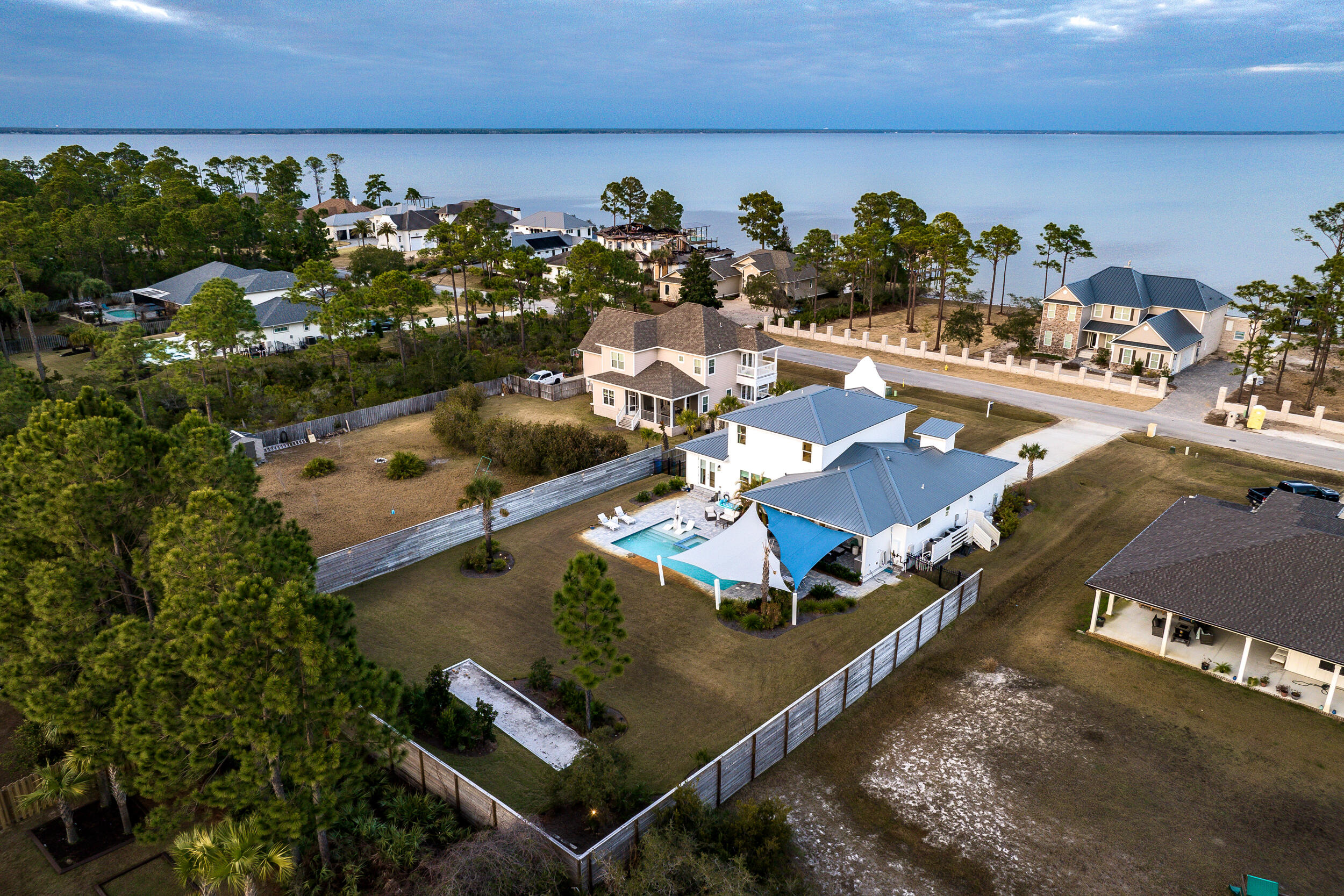 1478 Driftwood Point Road Santa Rosa Beach, FL 32459 - Photo 88 of 95 an aerial view of a house with a garden