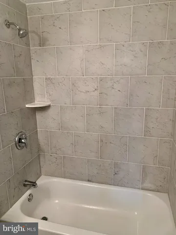 a bathroom with a tub