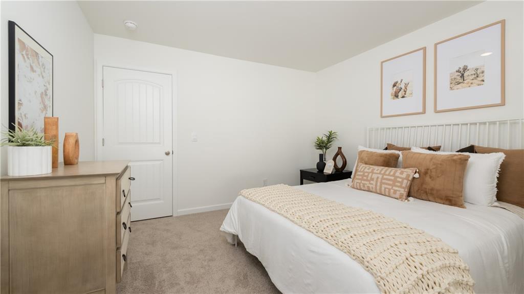3572 Matthew Court Decatur, GA 30034 - Photo 29 of 33 a bedroom with a bed and couch