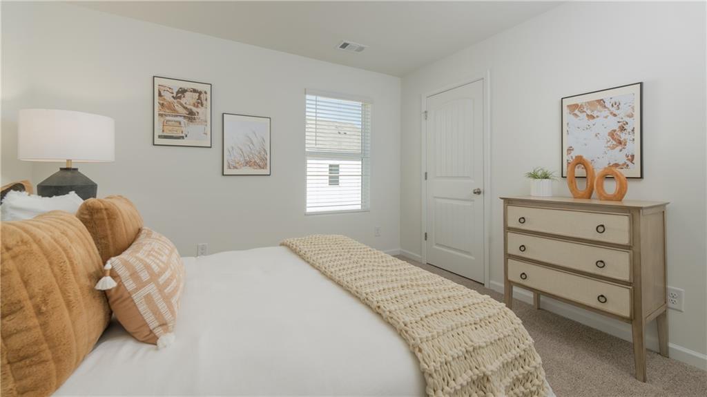 3572 Matthew Court Decatur, GA 30034 - Photo 30 of 33 a bedroom with a bed and a window