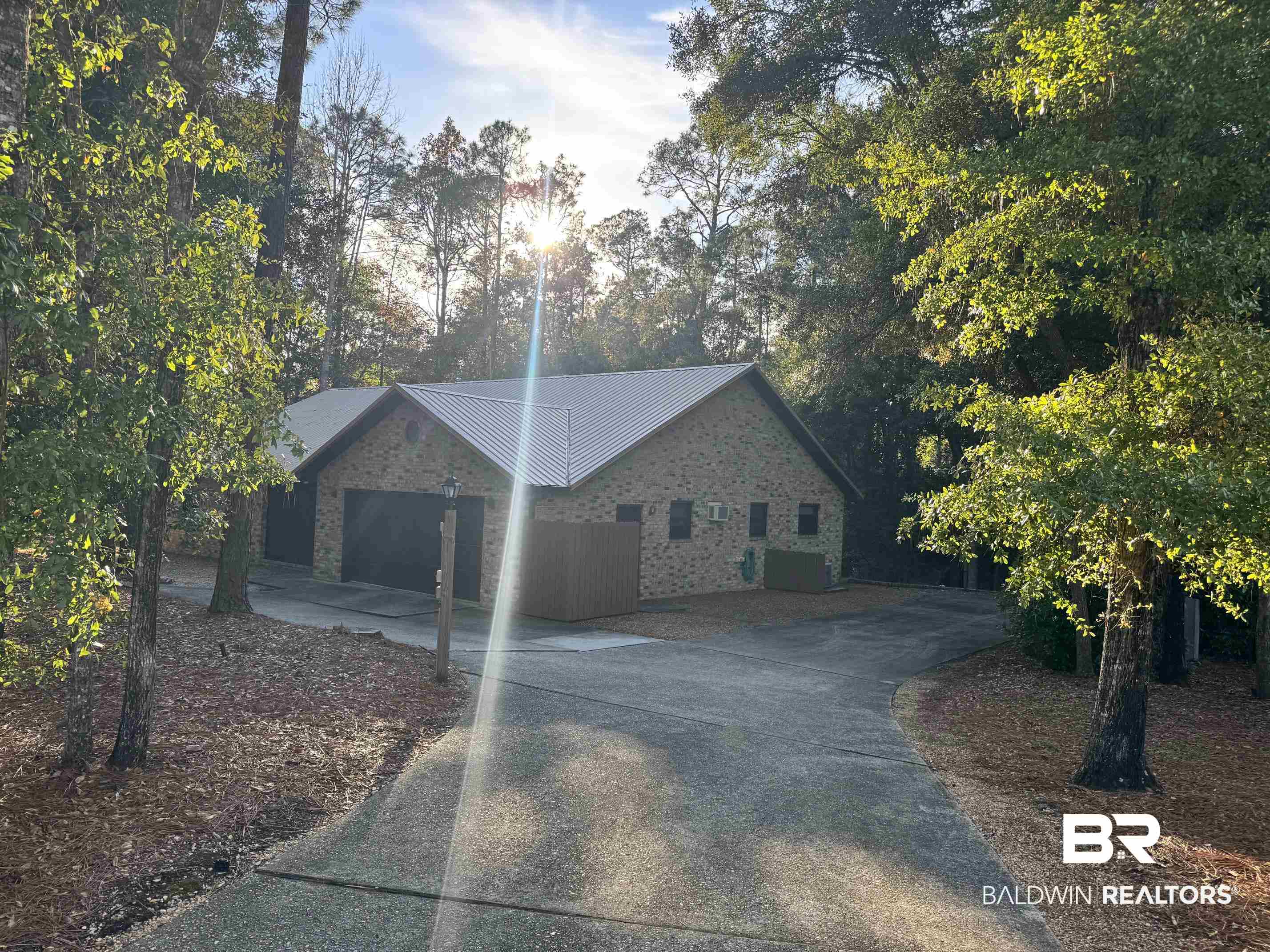 2682 Pine Ridge Drive Lillian, AL 36549 - Photo 2 of 37 View of front facade with a garage and central air condition unit