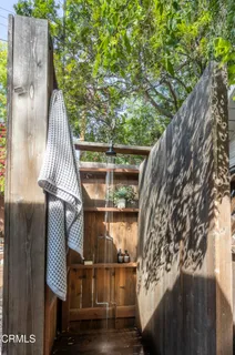 a view of a bench in front of a house