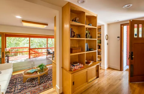 a living room with furniture and a table