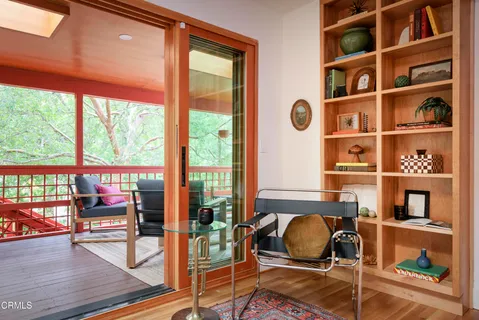 a view of a dining room with furniture window and outside view