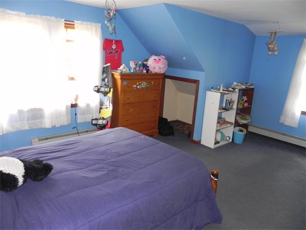 17 Spectacle Pond Road Wareham, MA 02538 - Photo 13 of 19 a bedroom with a bed and a window