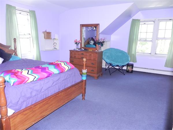 17 Spectacle Pond Road Wareham, MA 02538 - Photo 14 of 19 a bedroom with a bed and a table