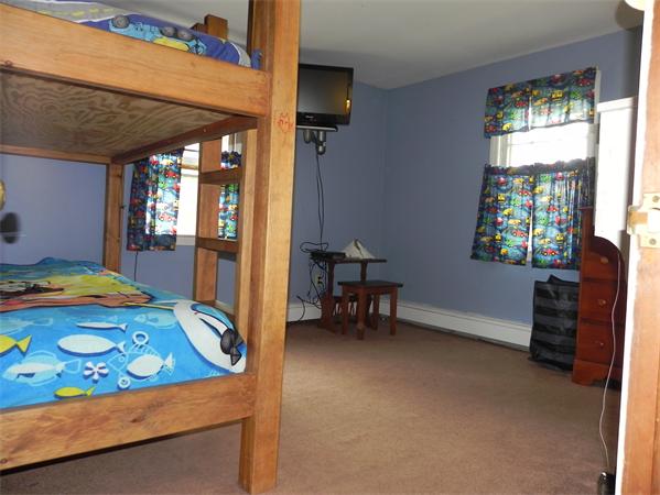 17 Spectacle Pond Road Wareham, MA 02538 - Photo 15 of 19 a bedroom with a bed and a window