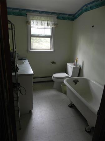 17 Spectacle Pond Road Wareham, MA 02538 - Photo 16 of 19 a living room with furniture and a window