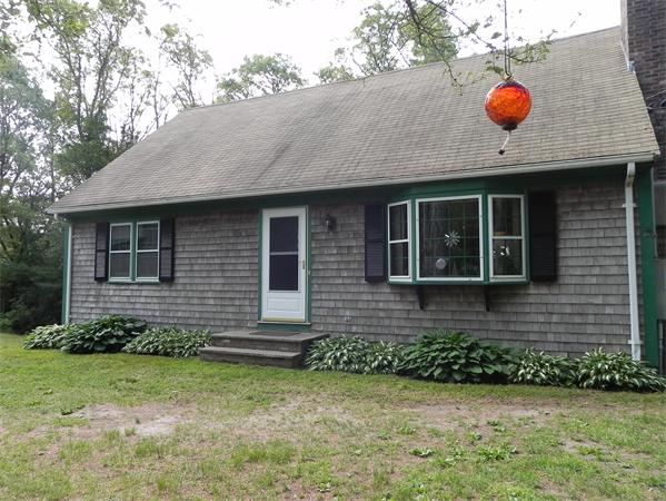 17 Spectacle Pond Road Wareham, MA 02538 - Photo 3 of 19 a front view of a house with garden