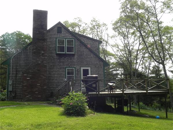 17 Spectacle Pond Road Wareham, MA 02538 - Photo 4 of 19 a backyard of a house with lots of green space