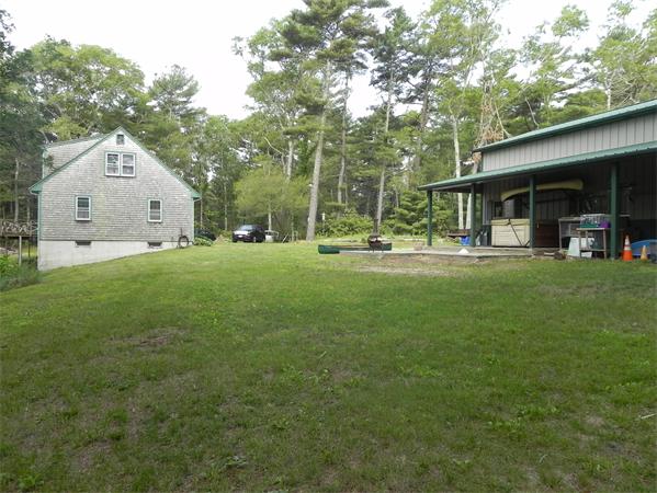 17 Spectacle Pond Road Wareham, MA 02538 - Photo 5 of 19 a view of a house with a yard and sitting area