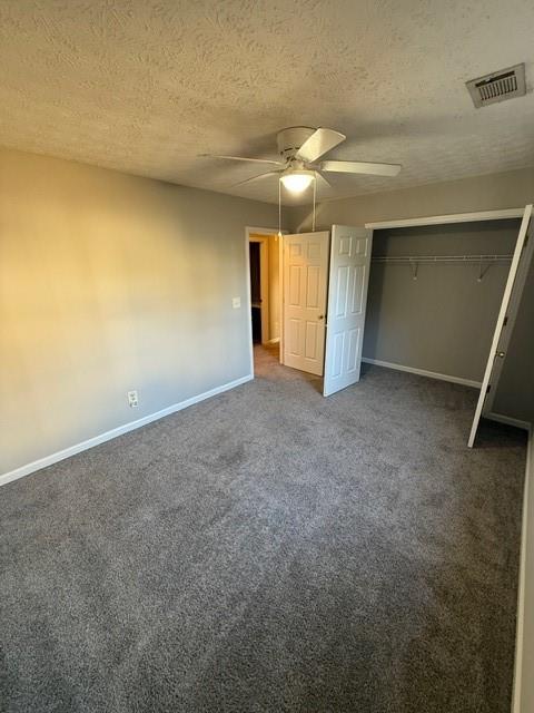 836 Freedom Walk Locust Grove, GA 30248 - Photo 11 of 21 an empty room with a empty space and windows