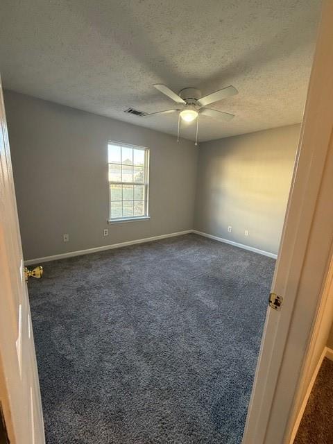 836 Freedom Walk Locust Grove, GA 30248 - Photo 12 of 21 en empty room with windows and entrance