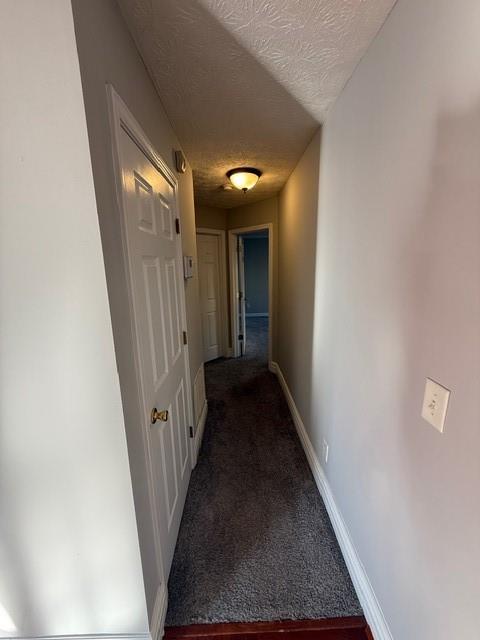 836 Freedom Walk Locust Grove, GA 30248 - Photo 15 of 21 a view of a hallway with a white walls