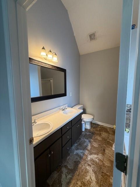 836 Freedom Walk Locust Grove, GA 30248 - Photo 19 of 21 a bathroom with a sink and mirror