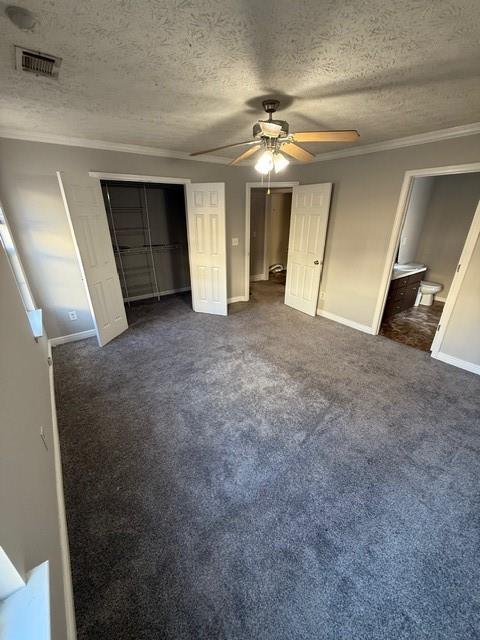 836 Freedom Walk Locust Grove, GA 30248 - Photo 10 of 21 a view of a big room with windows and chandelier fan