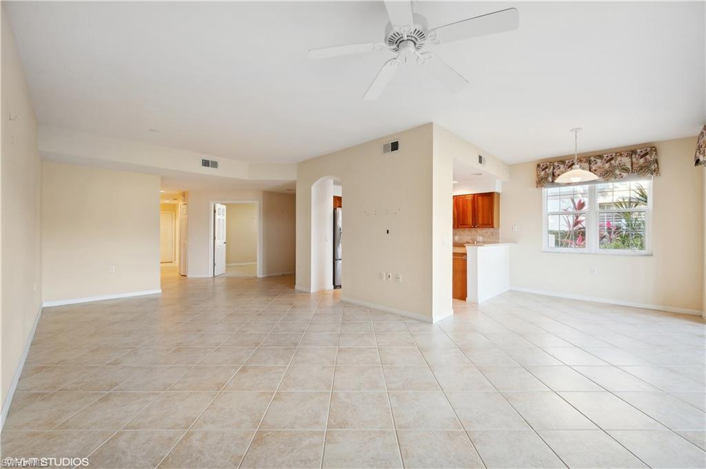 22931 Rosedale Drive, Unit 101 Estero, FL 34135 - Photo 12 of 35 a view of an empty room with a window