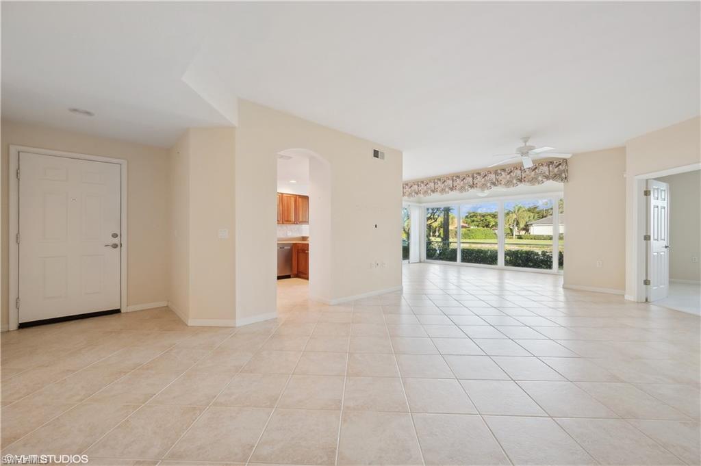 22931 Rosedale Drive, Unit 101 Estero, FL 34135 - Photo 8 of 35 a view of an empty room with a window