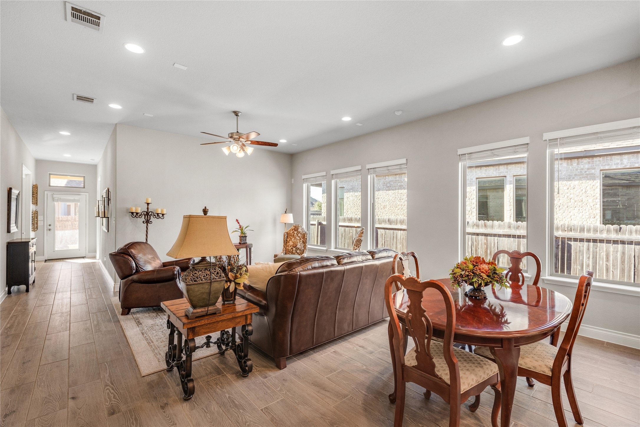 220 Freeman Loop Liberty Hill, TX 78642 - Photo 10 of 40 Welcoming interior with neutral paint colors and recessed lighting.