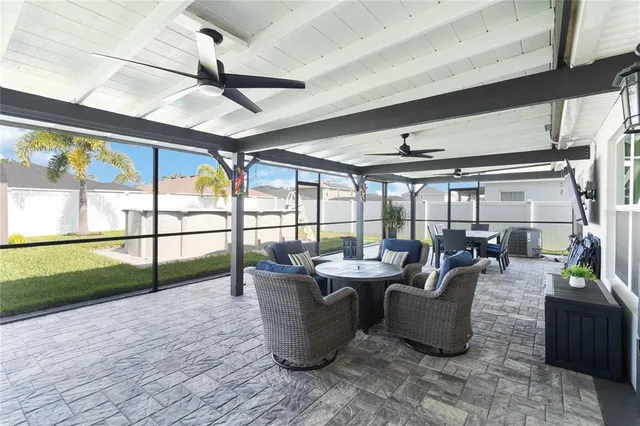a view of a dining room with furniture window and outside view