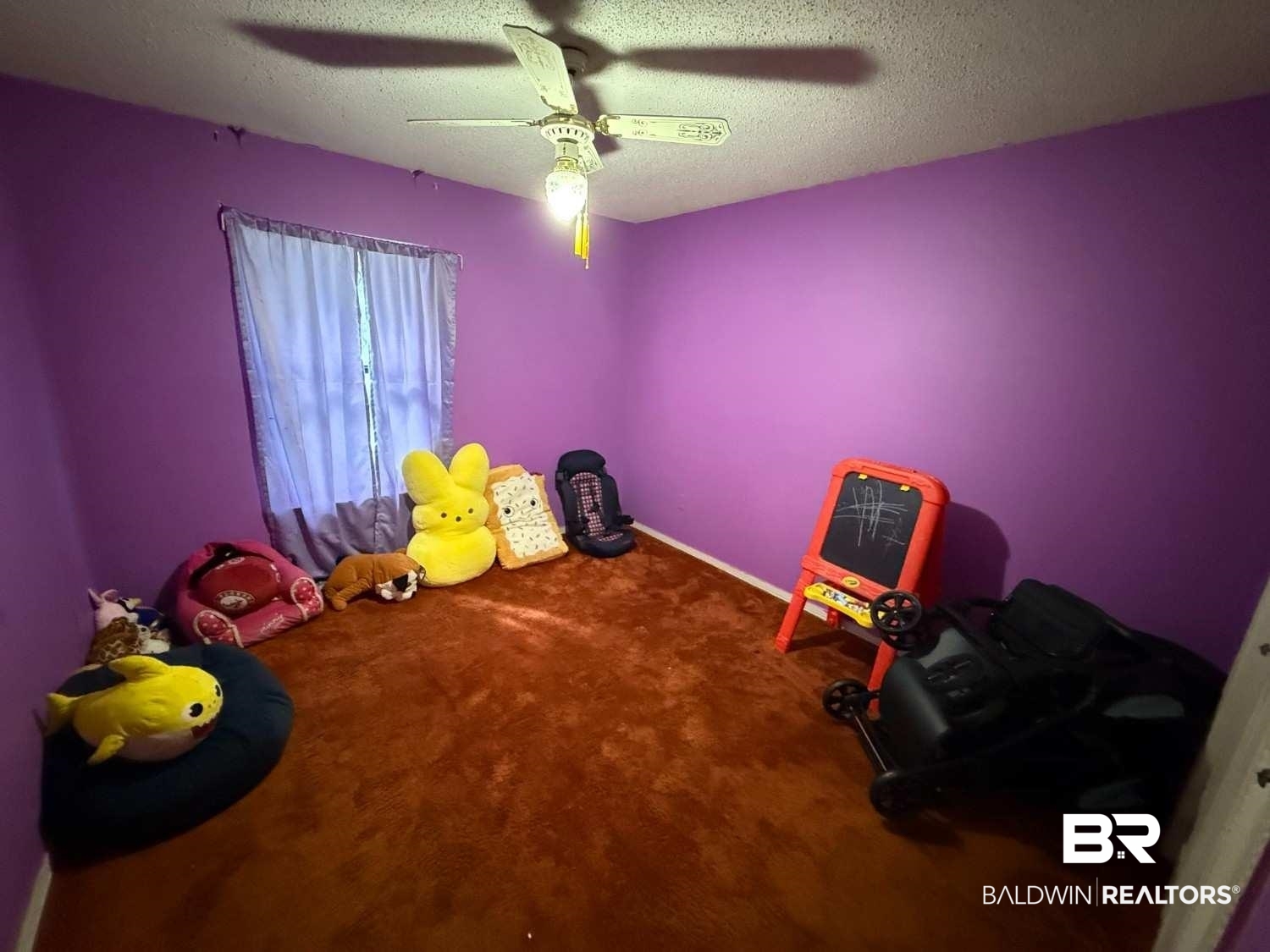 3721 Robertson Court Mobile, AL 36693 - Photo 22 of 22 Rec room with a textured ceiling, carpet, and ceiling fan