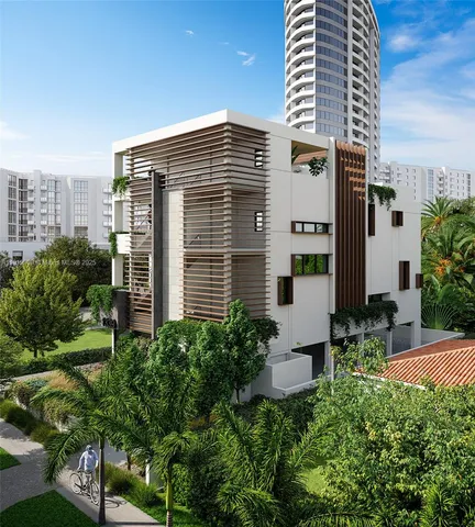 a view of a building next to a yard