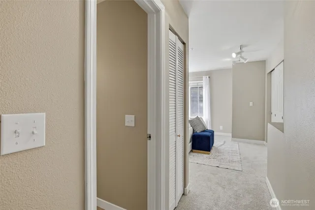 a white toilet sitting next to a bathroom sink