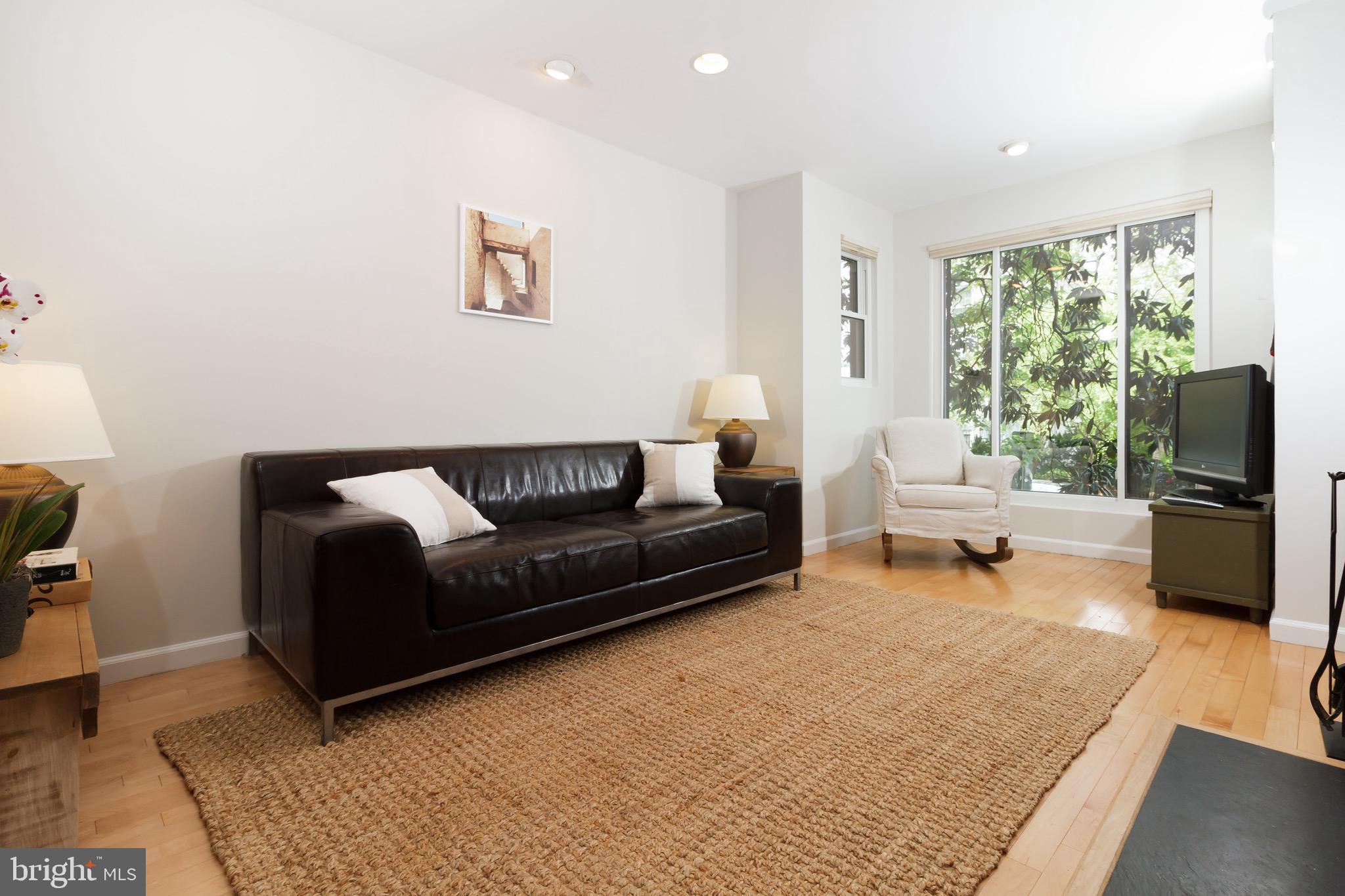 1810 Kalorama Road Northwest, Unit A2 Washington, DC 20009 - Photo 1 of 22 Wonderful living room with wood burning fireplace