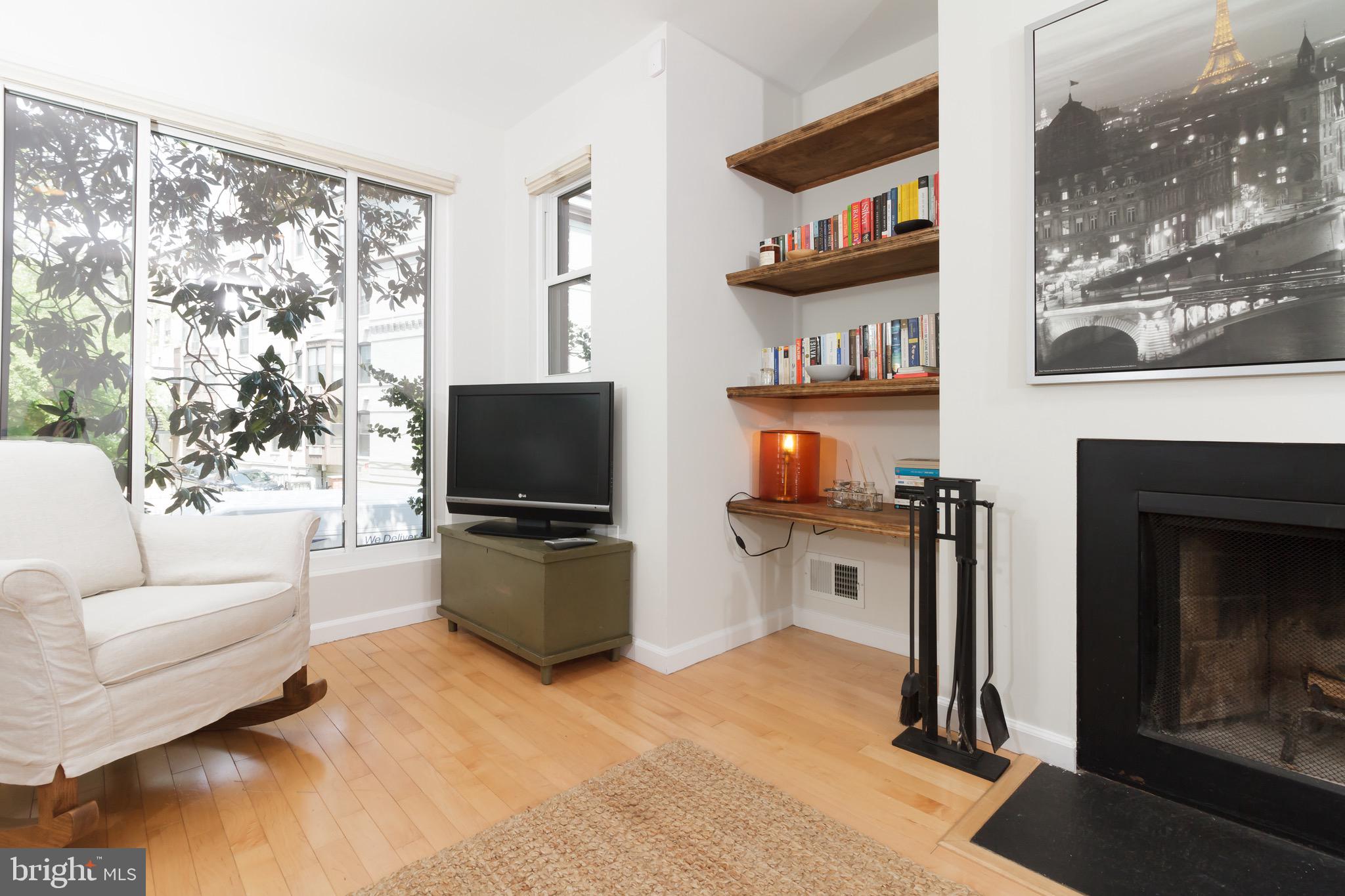 1810 Kalorama Road Northwest, Unit A2 Washington, DC 20009 - Photo 3 of 22 Wonderful living room with wood burning fireplace