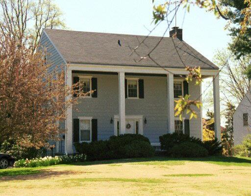 3 Saddle Rock Road Stamford, CT 06902 - Photo 1 of 1 a front view of a house with a yard