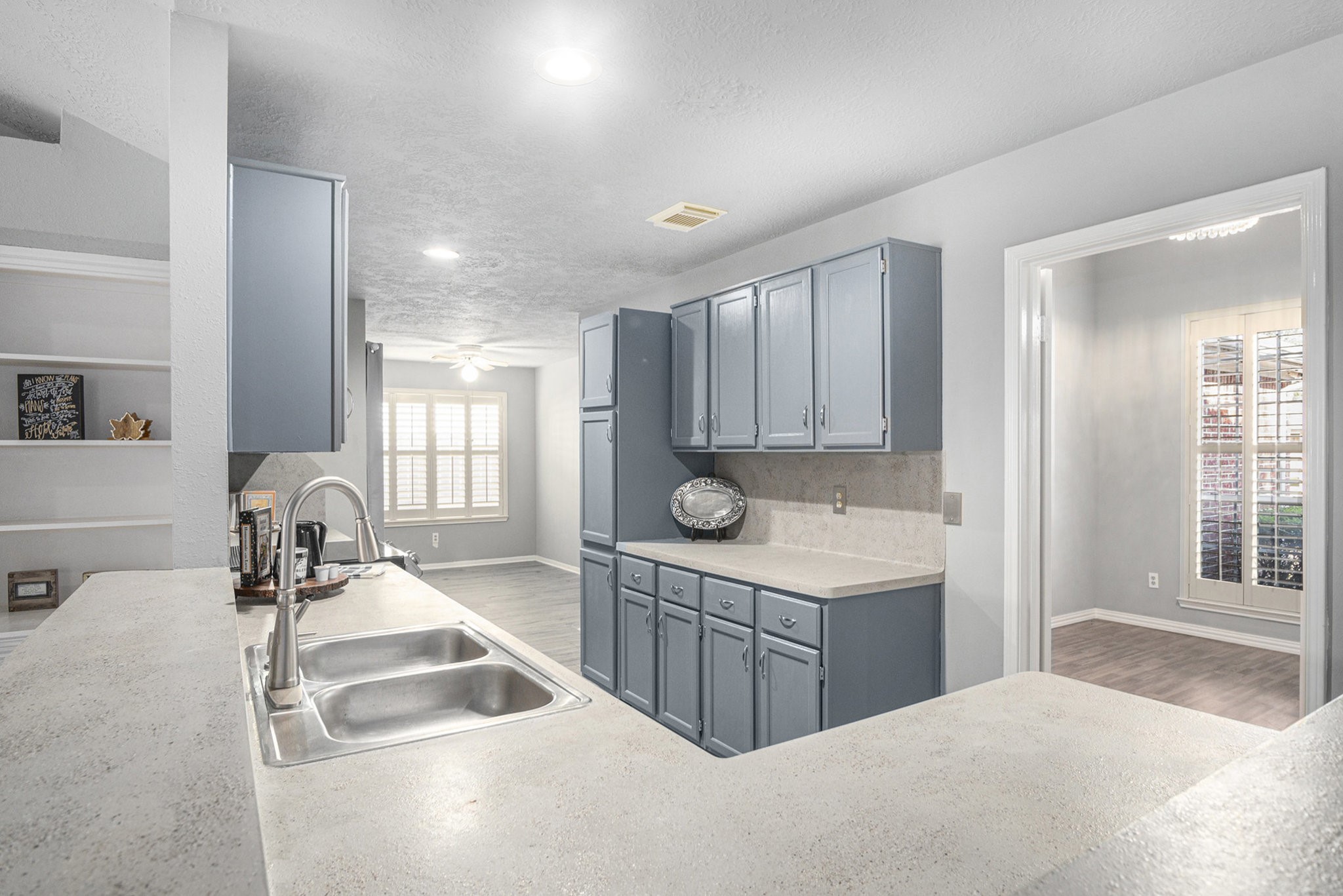 3315 Mourning Dove Drive Spring, TX 77388 - Photo 12 of 44 a kitchen with a sink cabinets and window