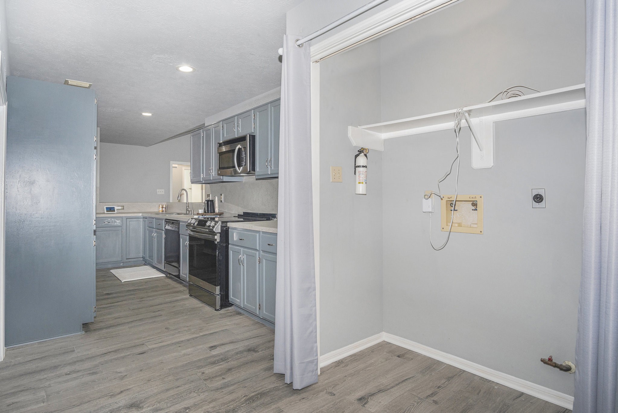 3315 Mourning Dove Drive Spring, TX 77388 - Photo 21 of 44 a kitchen with a refrigerator and a stove top oven