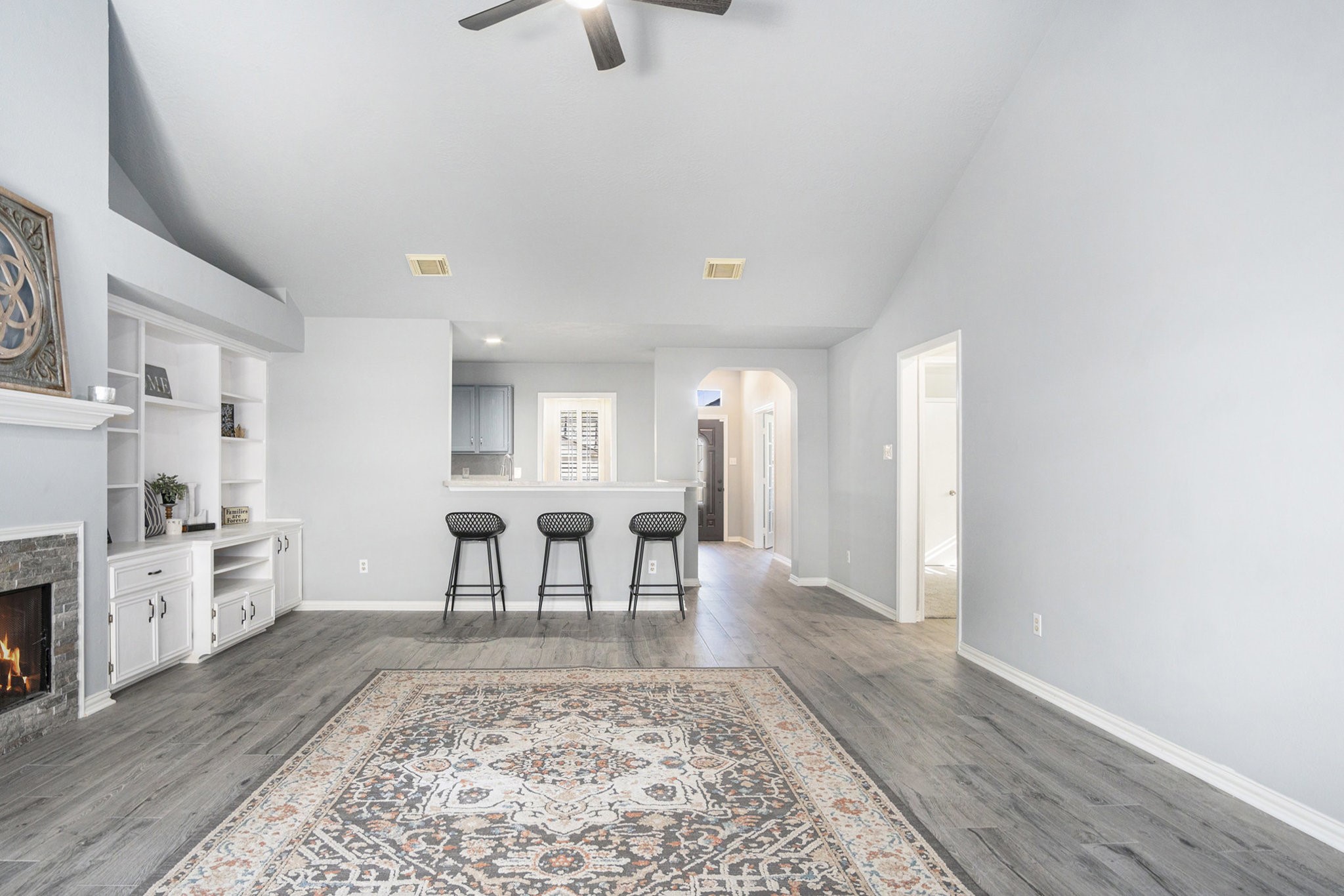 3315 Mourning Dove Drive Spring, TX 77388 - Photo 27 of 44 a view of a livingroom with furniture a fireplace wooden floor and windows