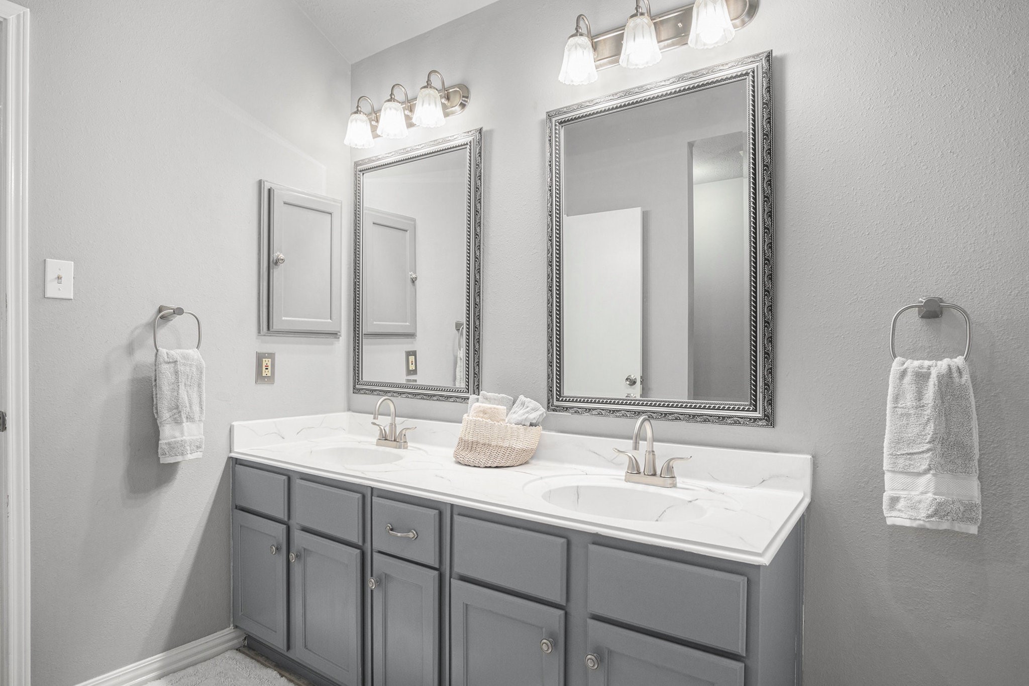 3315 Mourning Dove Drive Spring, TX 77388 - Photo 31 of 44 a bathroom with 2 sink and a mirror